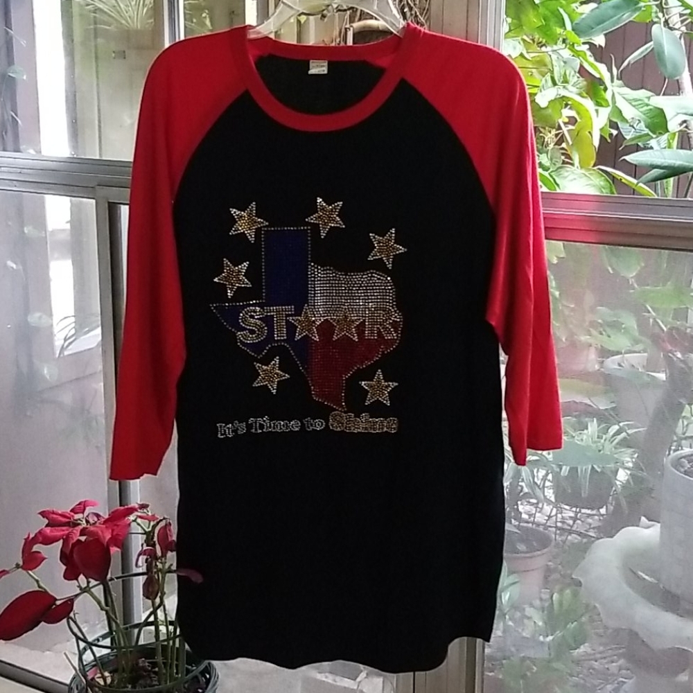 Black and red shirt with Texas logo on it.